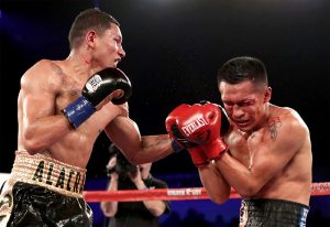Miguel Berchelt (left) lands a left hook to the bloody face of Francisco Vargas en route to stopping the previously unbeaten WBC 130-pound titleholder on January 28, 2017, in Indio, California. Photo by Tom Hogan-Hoganphotos / Golden Boy Promotions