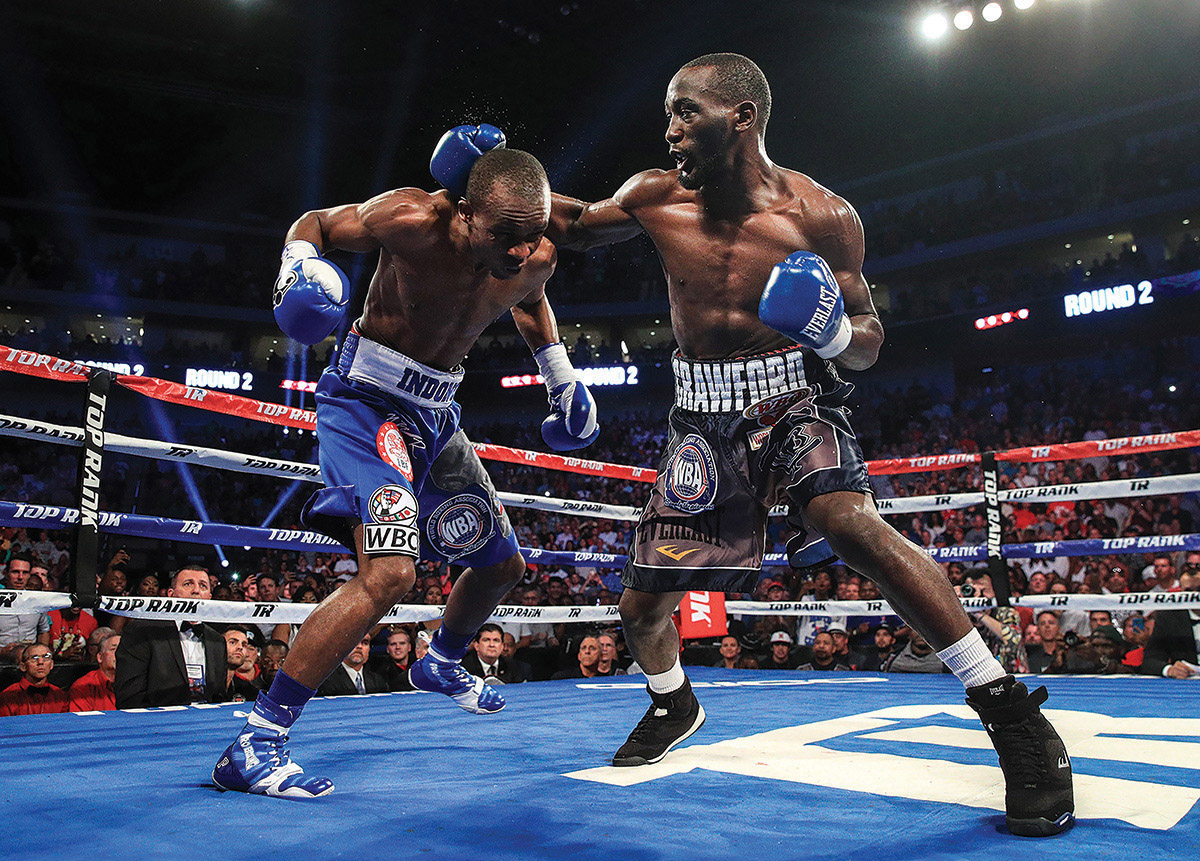 Terence Crawford (right) vs. Julius Indongo. Photo credit: Mikey Williams/Top Rank