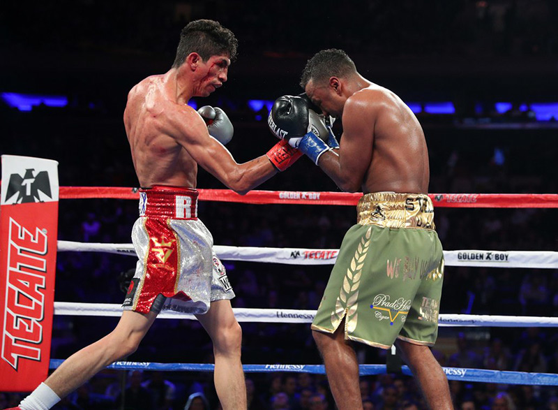 Rey Vargas lands an uppercut to Oscar Negrete en route to scoring a lopsided 12-round decision on December 2, 2017 in New York City. Photo / @HBOBoxing