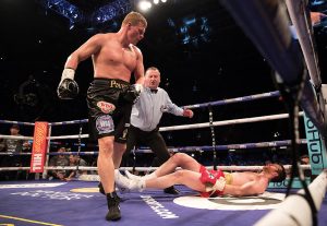 Heavyweight contender Alexander Povetkin (standing) vs. David Price. Photo by Richard Heathcote/Getty Images