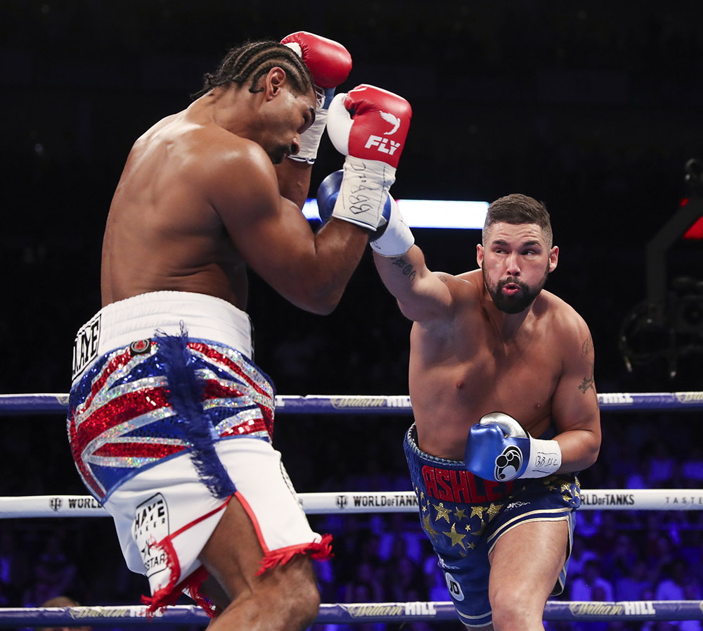 Tony Bellew (right) tags David Haye. Photo by Lawrence Lustig