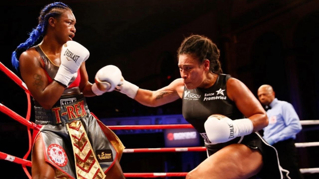 Undefeated two-division female middleweight titlist Claressa Shields (left) vs. WBA/WBO junior middleweight beltholder Hanna Gabriels. Image courtesy of YouTube.