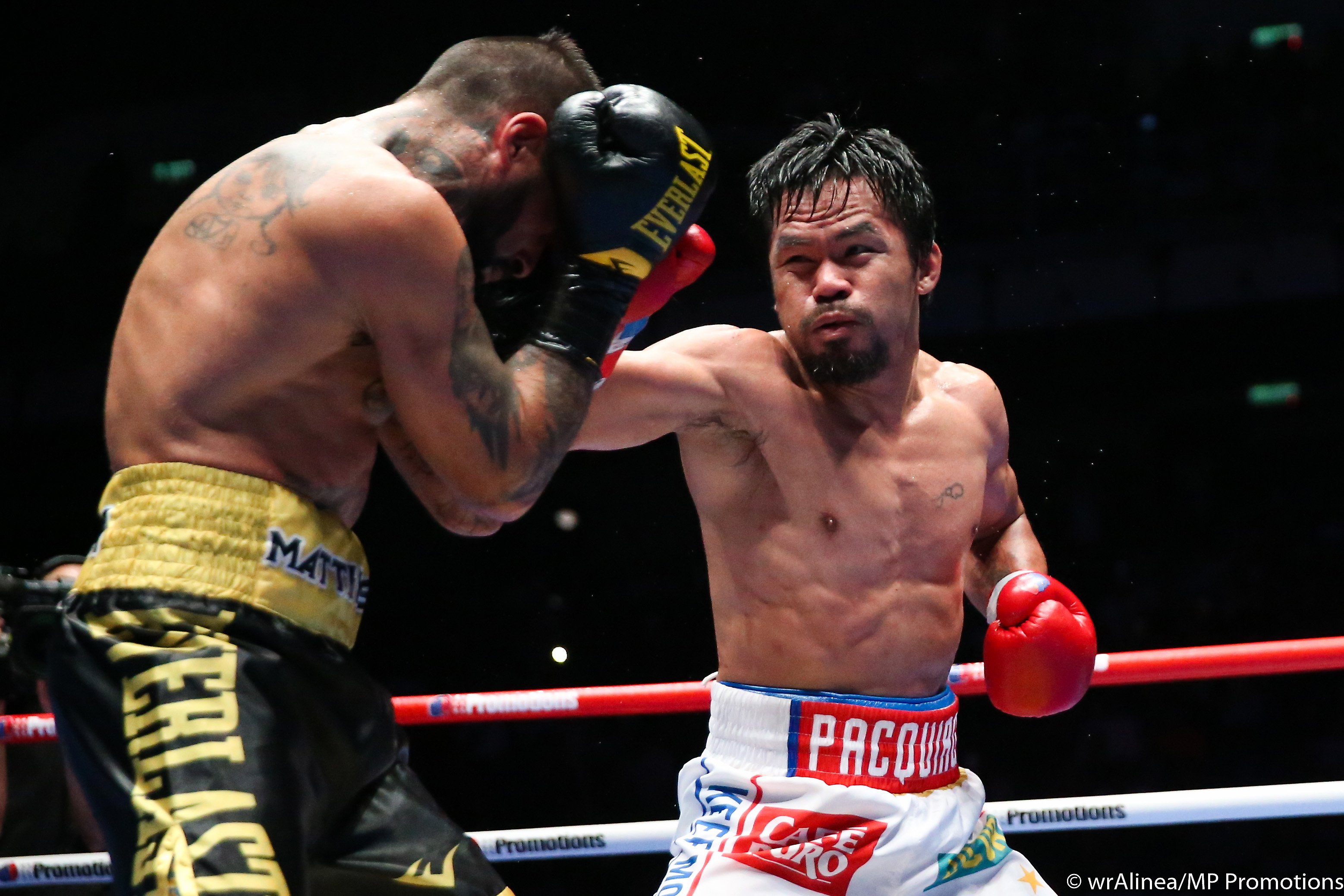 Manny Pacquiao (right) vs. Lucas Matthysse. Photo credit: WR Alinea/MP Promotions