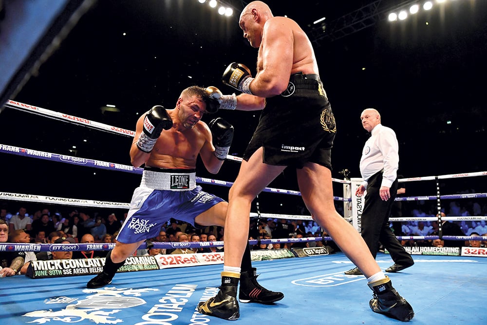 Sefer Seferi (left) couldn't get anywhere against Tyson Fury. (Photo by Justin Setterfield/Getty Images)
