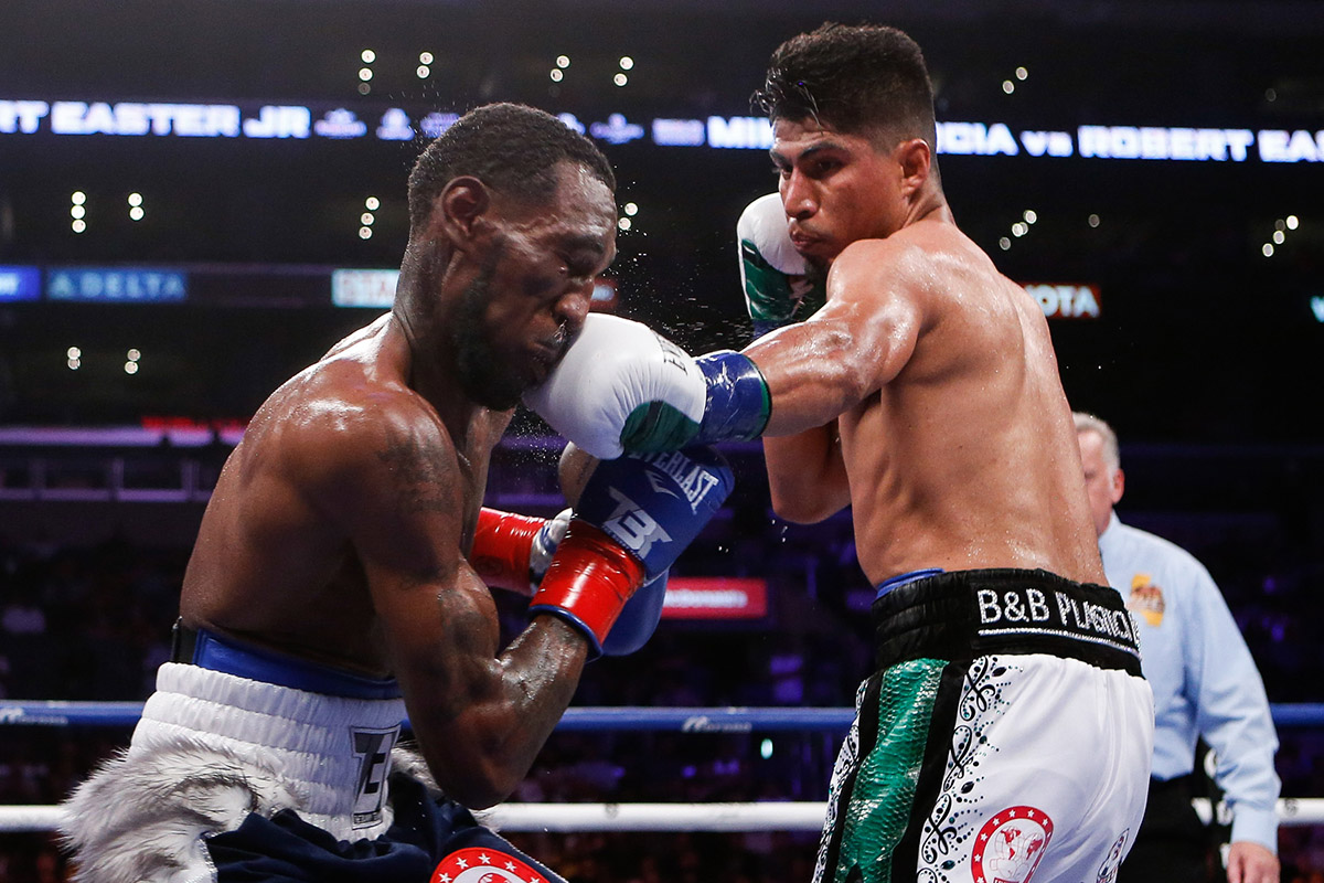 Mikey Garcia (right) was too much for fellow lightweight beltholder Robert Easter Jr. to handle, but what happens if he takes on welterweight destroyer Errol Spence Jr. next?