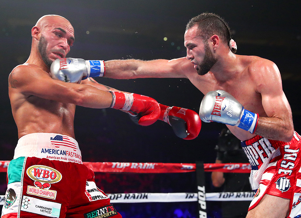 Jose Pedraza (right) en route to winning the WBO lightweight title against Raymundo Beltran. Photo credit: Mikey Williams/Top Rank