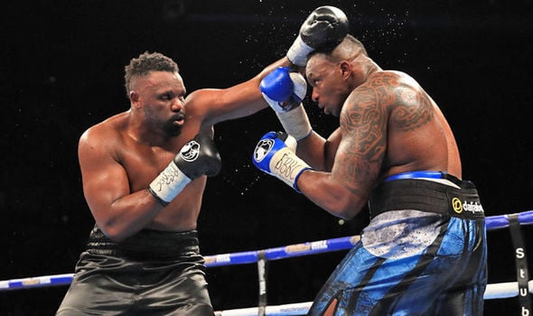 Dereck Chisora (left) and Dillian Whyte go to war in their first fight. Photo by Lawrence Lustig