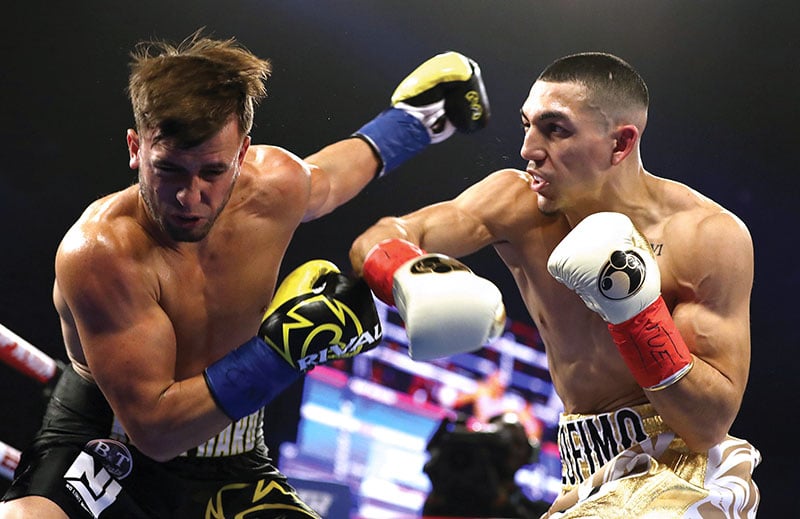 Lightweight Teofimo Lopez (right) vs. Mason Menard. Photo credit: Al Bello/Getty Images