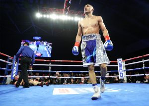 Teofimo Lopez (foreground). Photo credit: Mikey Williams/Top Rank