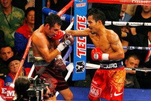 Oscar De La Hoya (left) vs. Manny Pacquiao. Photo credit: Ed Mulholland/HBO Boxing