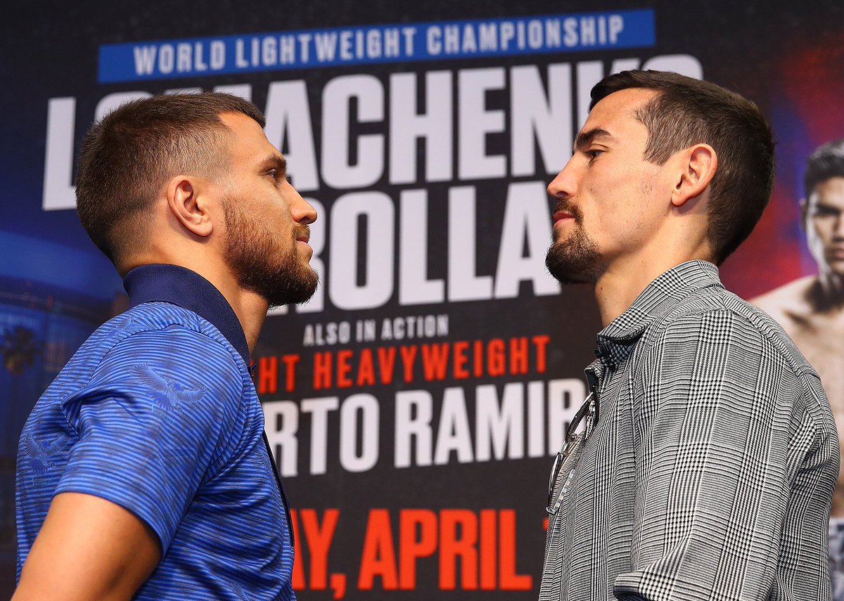 Vasiliy Lomachenko (left) and Anthony Crolla engage in a staredown following the final press conference for their April 12 lightweight championship bout. Photo by Mikey Williams/Top Rank