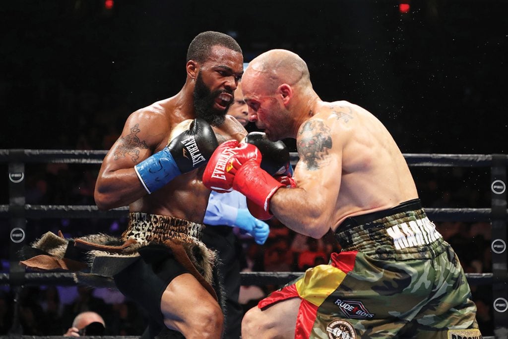 Gary Russell (left) opens up on Kiko Martinez. Photo by Al Bello/ Getty Images
