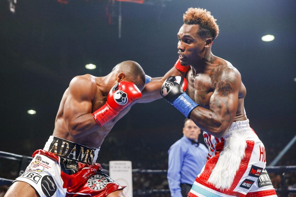 Jermall Charlo (right) nails Brandon Adams en route to his unanimous WBC middleweight title defense Saturday night. Photo by Esther Lin/Showtime