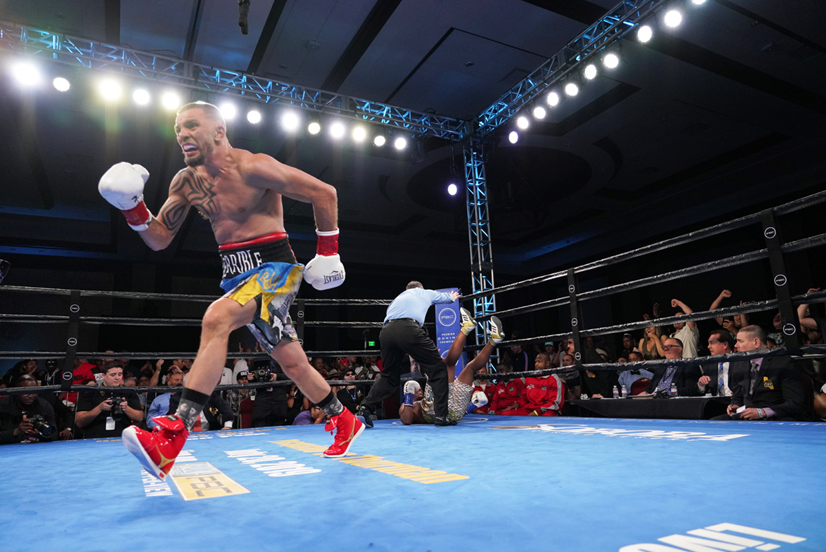 Ivan Redkach (foreground) ran for joy after knocking out Devon Alexander in the sixth round of their junior middleweight fight on June 1 in California. (Photo by Luis Mejia/TGB Promotions)