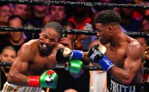 Errol Spence Jr. (right) scored a knockdown of Shawn Porter in the 11th and prevailed by scores of 116-111 on two cards to unify two of the welterweight title belts. Photo by German Villasenor