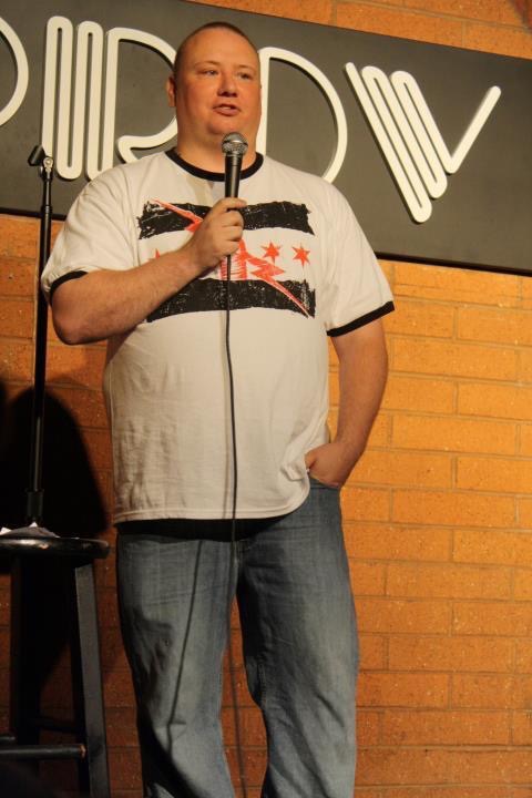 Boxing writer and standup comic Ernie Green on stage at the Tempe Improv in 2012. Photo credit: Ernie Green