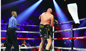 Mark Breland throws in the white towel, to save Deontay Wilder more punishment against Tyson Fury, Feb. 22, 2020.