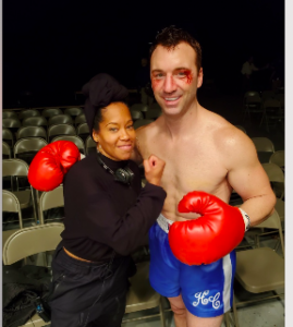 Regina King poses with ex fighter Sean Monaghan as Henry Cooper during filming of "One Night in Miami."