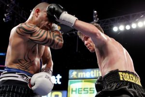 Yuri Foreman lands a left hand on Miguel Cotto.