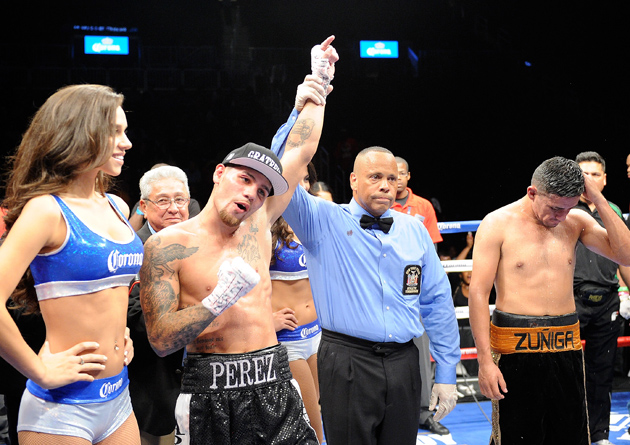 Michael Perez celebrates his win over Miguel Zuniga after their junior welterweight match at Barclays Center's Cushman & Wakefield Theater on Sept. 30, 2013 in Brooklyn, N.Y. Photo by Maddie Meyer/Getty Images