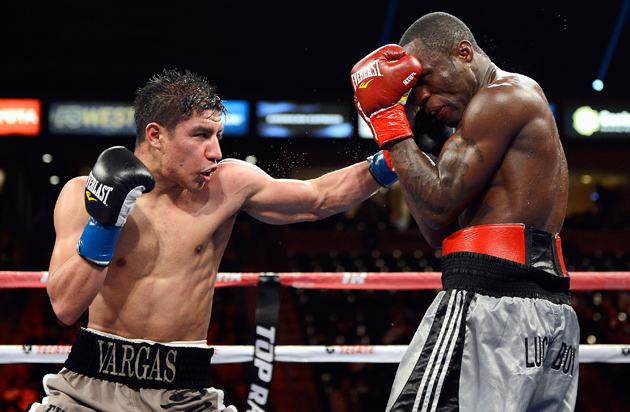 Jessie Vargas lands a hook to fellow unbeaten prospect Walle Omotoso en route to winning a decision last year. Photo by Kevork Djansenzian-Getty Images