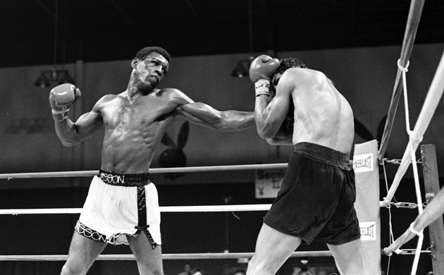 Matthew Saad Muhammad (left) lands a sweeping left against Yaqui Lopez during their 15-round battle at the Great Gorge Playboy Club on July 13, 1980 in McAfee, New Jersey. Saad Muhammad retained his WBC light heavyweight title in THE RING&rsquo;s Fight of the Year. Photo by The Ring Magazine/Getty Images