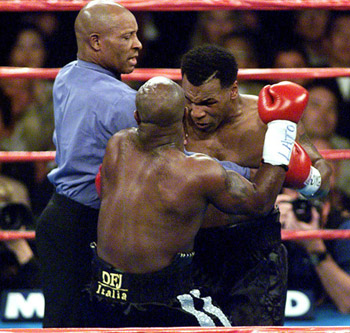 Former Heavyweight Champion Mike Tyson (R) prepare