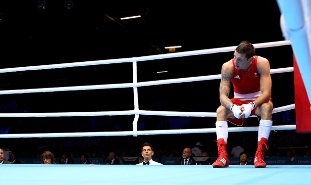 Damien Hooper looks dejected after losing to Egor Mekhontcev at the 2012 Olympic Games in London, England. Mekhontcev won the gold medal, but Hooper is developing into a hot light heavyweight pro prospect. Photo by Scott Heavey/Getty Images