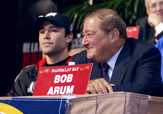 Oscar De La Hoya and Bob Arum in 2002 at a press conference for De La Hoya's fight against Fernando Vargas. Photo by Jed Jacobsohn - Getty Images.