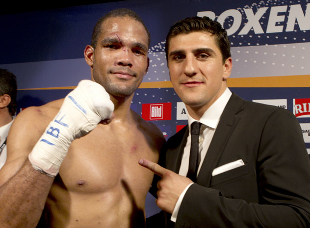 RING and IBF cruiser weight champion Yoan Pablo Hernandez (L) with WBO titleholder Marco Hauck following Hernandez's win over Steve Cunningham in October 2011. Photo by Winfried Mausolf.