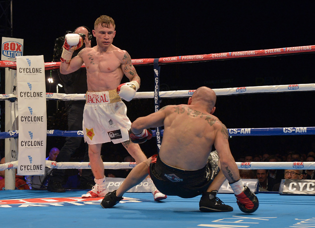 Carl Frampton drops Kiko Martinez in Round 5 of their IBF junior featherweight world title bout at the purpose-built 16,000 capacity Titanic slipway outdoor arena on Sept. 6, 2014 in Belfast, Northern Ireland. Photo by Charles McQuillan/Getty Images