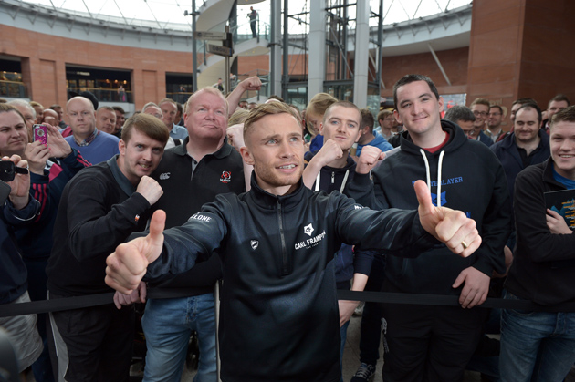 Carl Frampton poses with fans during a public workout at Victoria Square on Sept. 3 in Belfast, Northern Ireland. Frampton challenges reigning IBF 122-pound titleholder Kiko Martinez on Saturday in a purpose-built, 16,000 capacity outdoor arena in Belfast's Titanic Quarter. Photo by Charles McQuillan/Getty Images