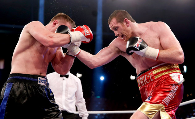 Yaroslav Zavorotnyi (L) takes a punch from David Price on June 7, 2014, in Schwerin, Germany. Photo by Boris Streubel - Bongarts/Getty Images.