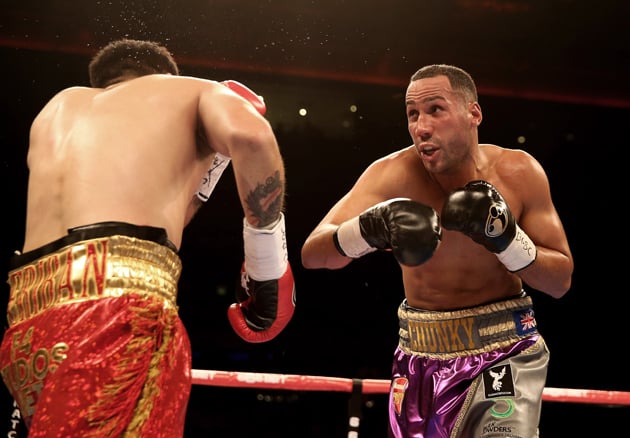 James DeGale (R) in his most recent fight, a third-round knockout of Marco Antonio Periban on Nov. 22, 2014, in Liverpool, England. Photo by Scott Heavey/ Getty Images.