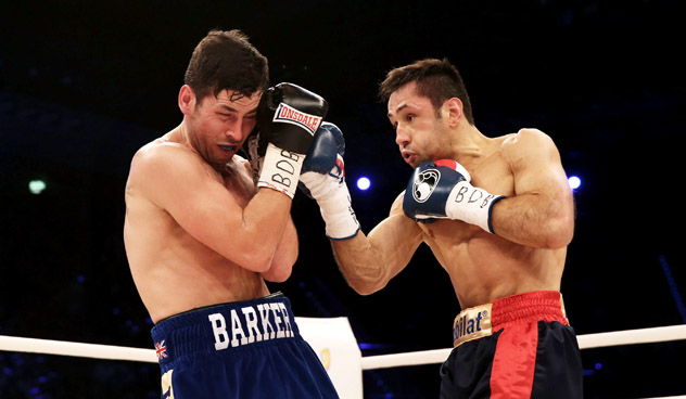 Felix Sturm (R) taking on Darren Barker for the IBF middleweight title in December 2013. Sturm won by second-round technical knockout. Photo by Simon Hofmann - Bongarts/Getty Images.