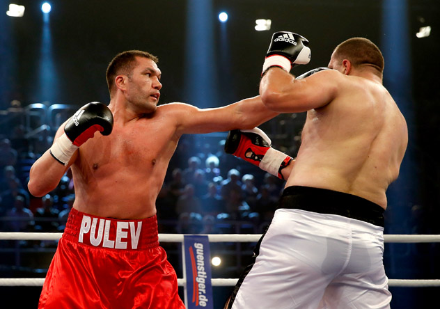 Heavyweight Kubrat Pulev (L) on his way to a fourth-round TKO of Joey Abell on Dec. 14, 2013. Photo by Boris Streubel - Bongarts/Getty Images.