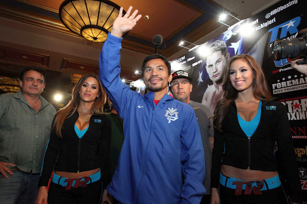 Manny Pacquiao arrives to The Venetian Macao Resort in Macau, China, where he will face Chris Algieri on Saturday. Photo by Chris Farina