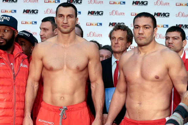 Wladimir Klitschko (L) with  Kubrat Pulev at the weigh-in for their Nov. 14 fight in Germany. Photo by Oliver Hardt - Bongarts/Getty Images.
