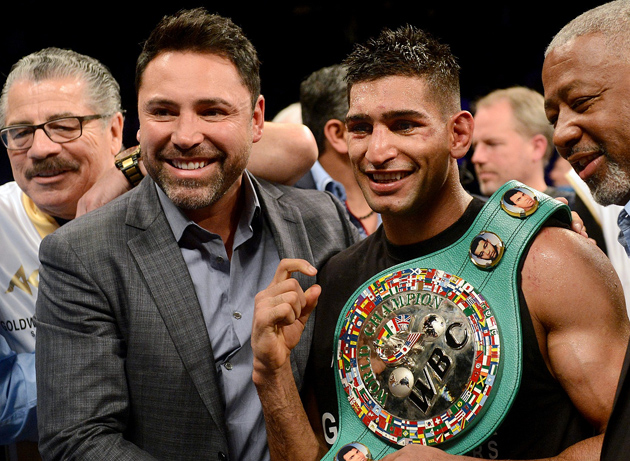 Golden Boy Promotions president Oscar De La Hoya will remain the promoter of UK star Amir Khan in the wake of a settlement with former company CEO Richard Schaefer, which resulted in the promotional release of other Al Haymon-advised fighters. Photo by Naoki Fukuda
