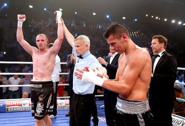 Roberto Bolonti (R) reacts to his unanimous-decision loss to Juergen Braehmer on June 7, 2014, in Germany. Photo by Boris Streubel/Bongarts-Getty Images