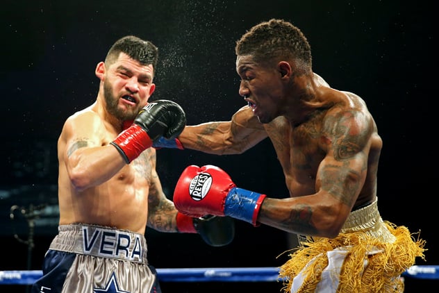 Willie Monroe Jr. (right) punches Bryan Vera during their middleweight fight at the Turning Stone Resort Casino on January 16 in Verona, New York.  Monroe Jr. won a 10-round decision. Photo by Alex Menendez/Getty Images