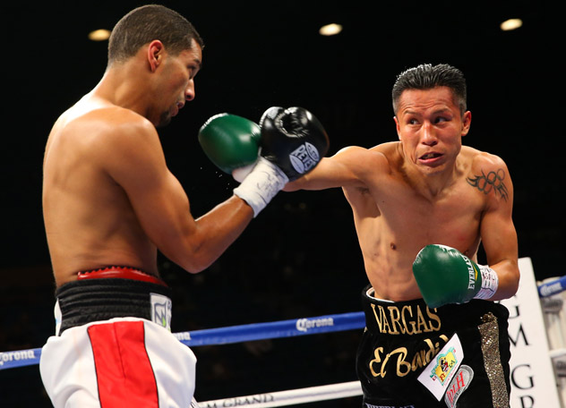 Francisco Vargas (R) inches aways from connecting with Abner Cotto's face on March 8, 2014, in Las Vegas. Vargas won the fight by unanimous decision. Photo by Ed Mulholland/Golden Boy Promotions-Getty Images.