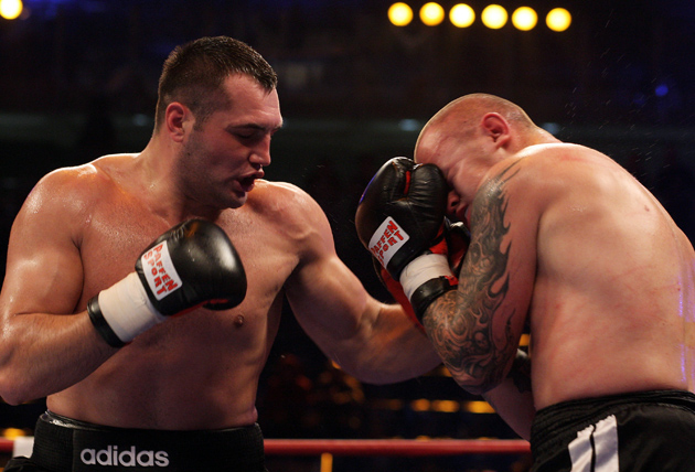 Christian Hammer (left) lands a left to Remigijus Ziausys during their six-round heavyweight bout at the Boerdelandhalle on Jan. 9, 2010 in Magdeburg, Germany. Hammer won a unanimous decision. Photo by Joern Pollex/Bongarts/Getty Images
