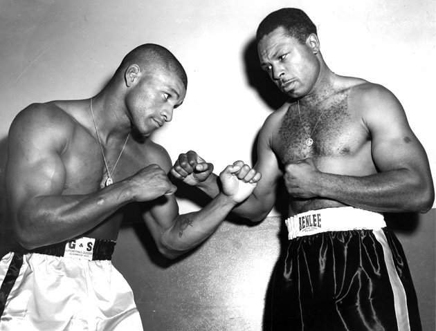 Harold Johnson (left) fought Archie Moore (right) five times, beating the all-time great once during their fight series. Photo / THE RING / Getty Images