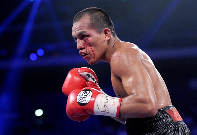 Milan Melindo during his fight against Juan Francisco Estrada in 2013. Photo: AFP/Getty.