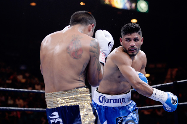 Abner Mares throws a right vs. Arturo S. Reyes during their featherweight bout at the MGM Grand Garden Arena on March 7 in Las Vegas. Photo by Harry How/Getty Images