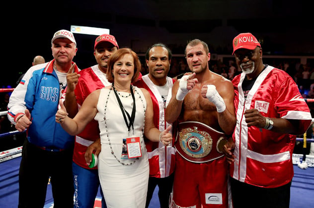 Kathy Duva with Sergey Kovalev and his team following the victory over Nathan Cleverly on Aug. 17, 2013. Photo by Scott Heavey/Getty Images.