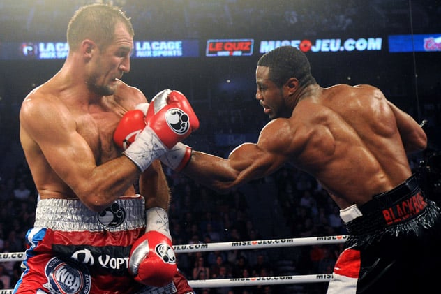 MONTREAL, QC - MARCH 14:  Jean Pascal (right) lands a body shot on Sergey Kovalev during their unified light heavyweight championship bout at the Bell Centre on March 14, 2015 in Montreal, Quebec, Canada.  (Photo by Richard Wolowicz/Getty Images)
