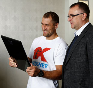 Kovalev holds his Fighter of the Year plaque.