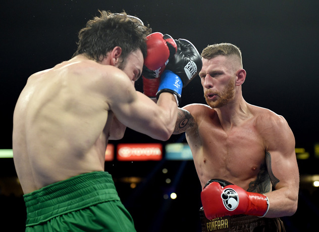 Andrzej Fonfara (R) punches Julio Cesar Chavez Jr. to a ninth-round TKO at StubHub Center on April 18, 2015 in Los Angeles, California.  Photo by Harry How/Getty Images